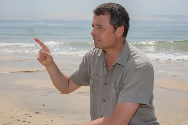 Bright picture of happy man on the beach — Stock Photo, Image