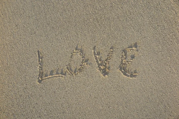 Kumlu plaj yazılı aşk — Stok fotoğraf