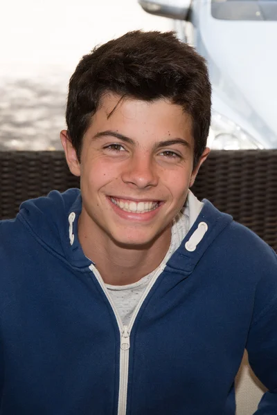 Portait of a young man,  teenager smiling — Stock Photo, Image