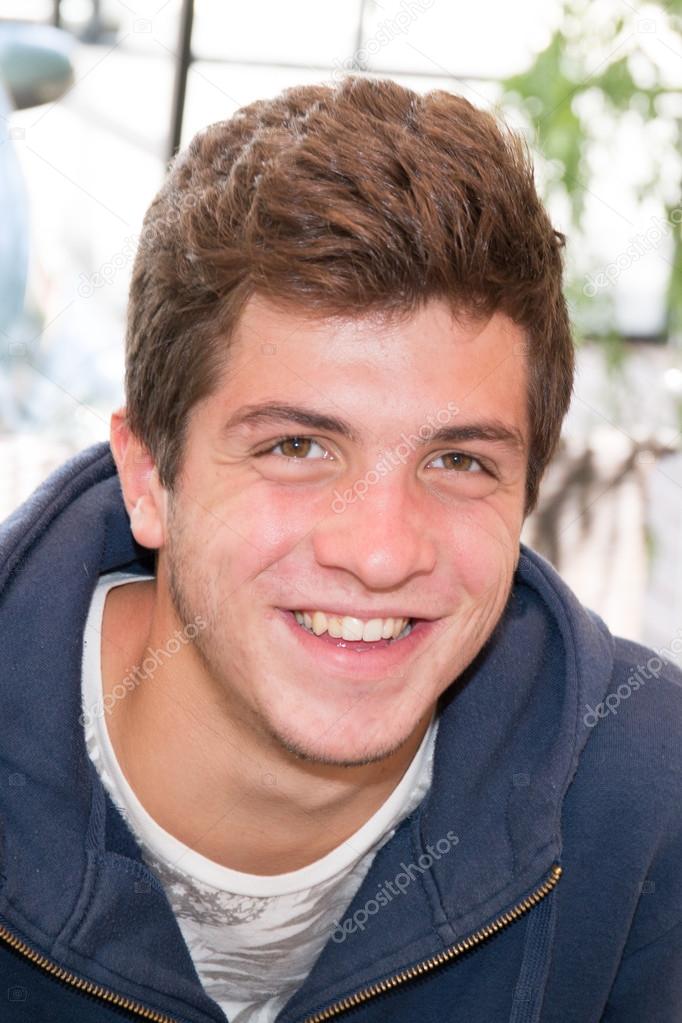 Portait of a young man,  teenager smiling