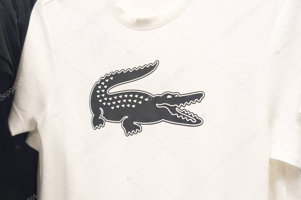 Bordeaux , france - 10 27 2025 : lacoste brand logo in interior shirt shop sign text interior tshirt store front boutique