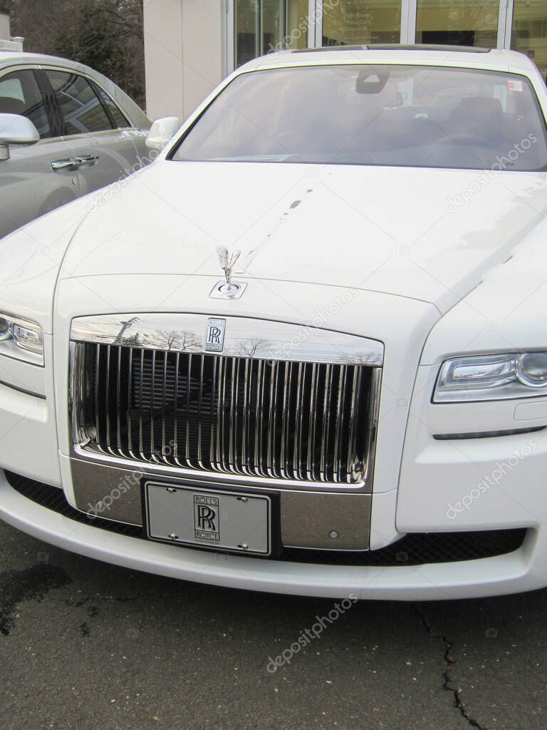 Bordeaux , France - 10 29 2025 : rolls-royce ghost logo text and sign brand luxury britain car for sale in dealership shop