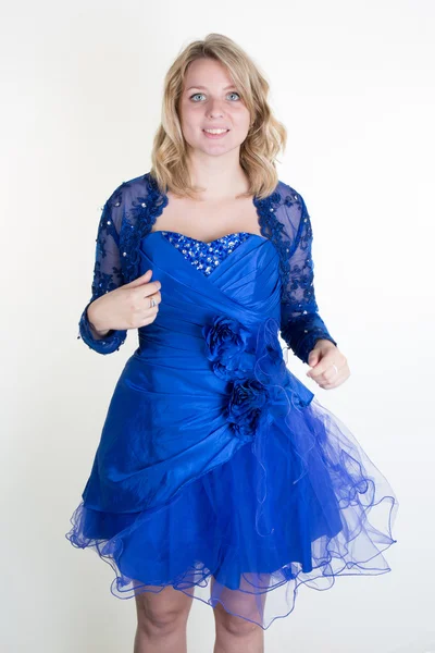 Gorgeous young blond woman with a beautiful blue dress — Stock Photo, Image