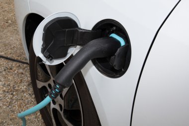 An electric car refuel with a power clipart