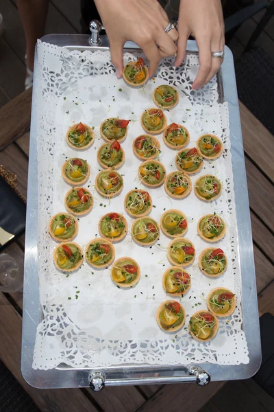 Delicious appetizer canapes of bread and guacamole — Stock Photo, Image