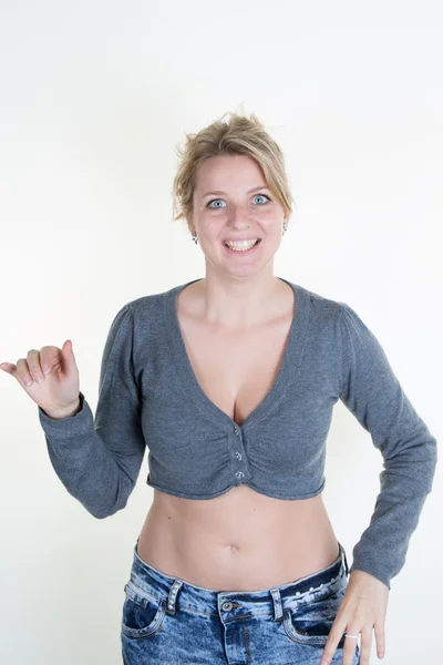 Blond woman posing in front of camera — Stock Photo, Image