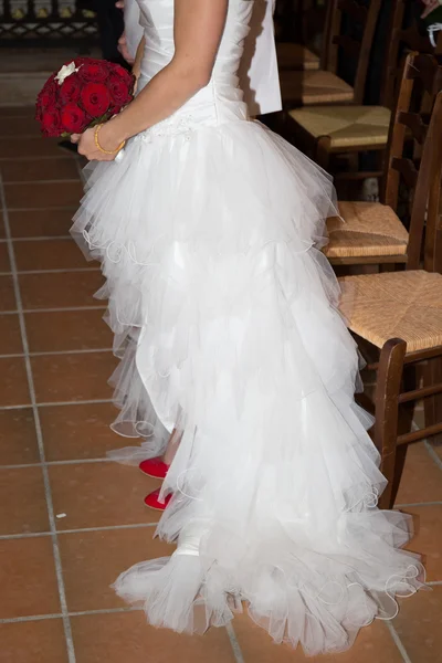 Beautiful bride in wedding dress with long train — Stock Photo, Image