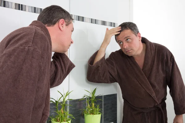 Handsome man in bathrobe — Stock Photo, Image