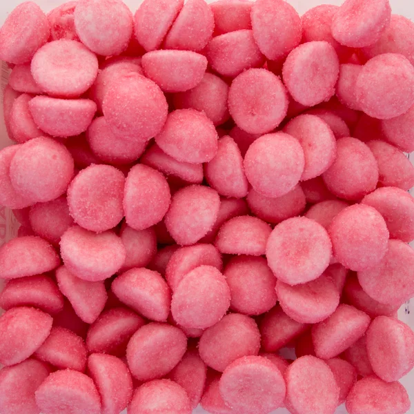 Tło cukierków różowe truskawki — Zdjęcie stockowe