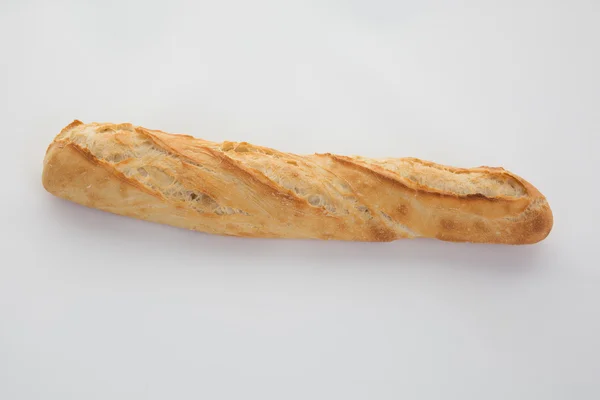 Французький багет, ізольований на білому тлі. — стокове фото
