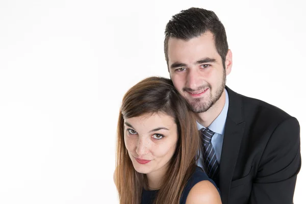 Cheerful young couple standing on white background, isolated with copy space — Stock Photo, Image