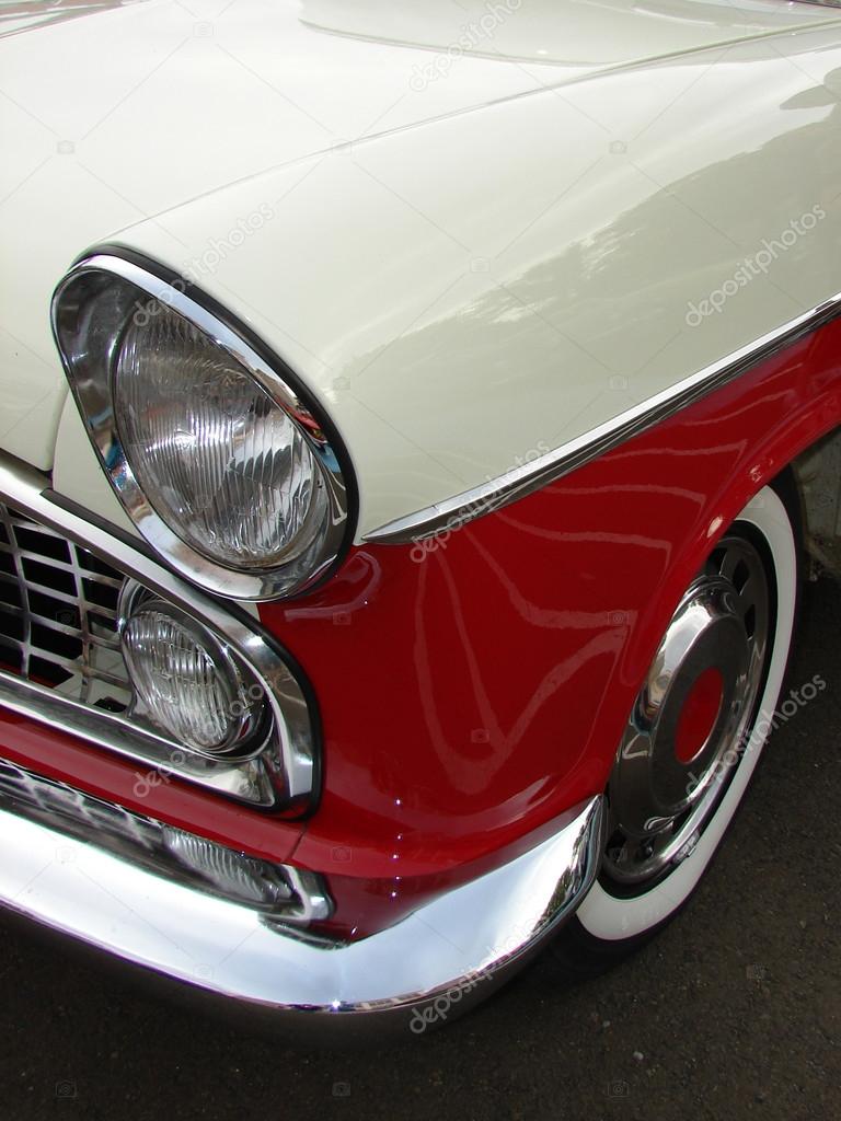 Front view of and old time car - red vintage car