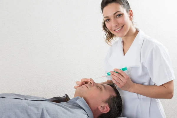 Man Having Botox Treatment At Beauty Clinic — Stock Photo, Image