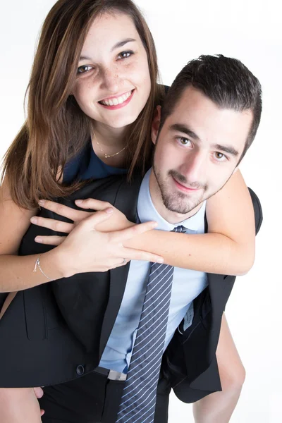 Pareja joven sonriendo a la cámara aislada en blanco — Foto de Stock