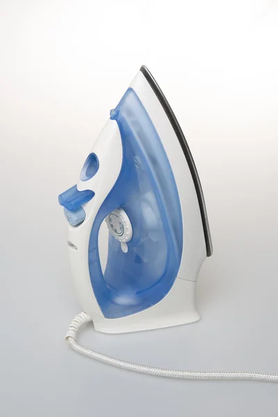 Blue and white Steam iron isolated on white background Stock Photo