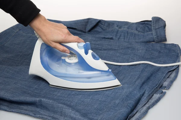 Ironing cloth with steam, closeup isolated on white — Stock Photo, Image