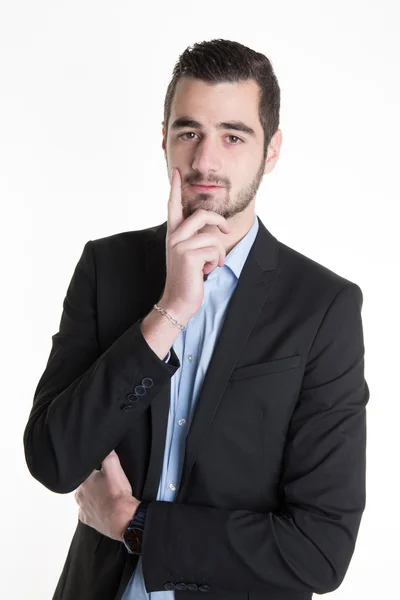 Porträt eines gutaussehenden jungen, nachdenklichen Mannes auf weißem Hintergrund — Stockfoto