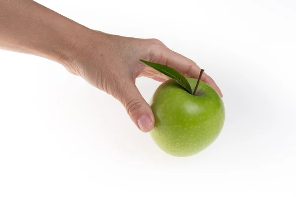 白地に隔離されたリンゴを手にとって — ストック写真