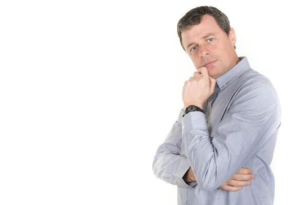 Pensive man looking up with arms crossed - isolated over white — Stock Photo, Image