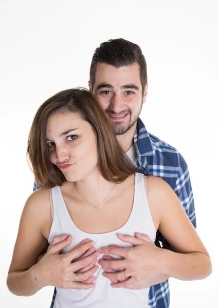 Joven hombre y mujer juntos sobre fondo blanco — Foto de Stock