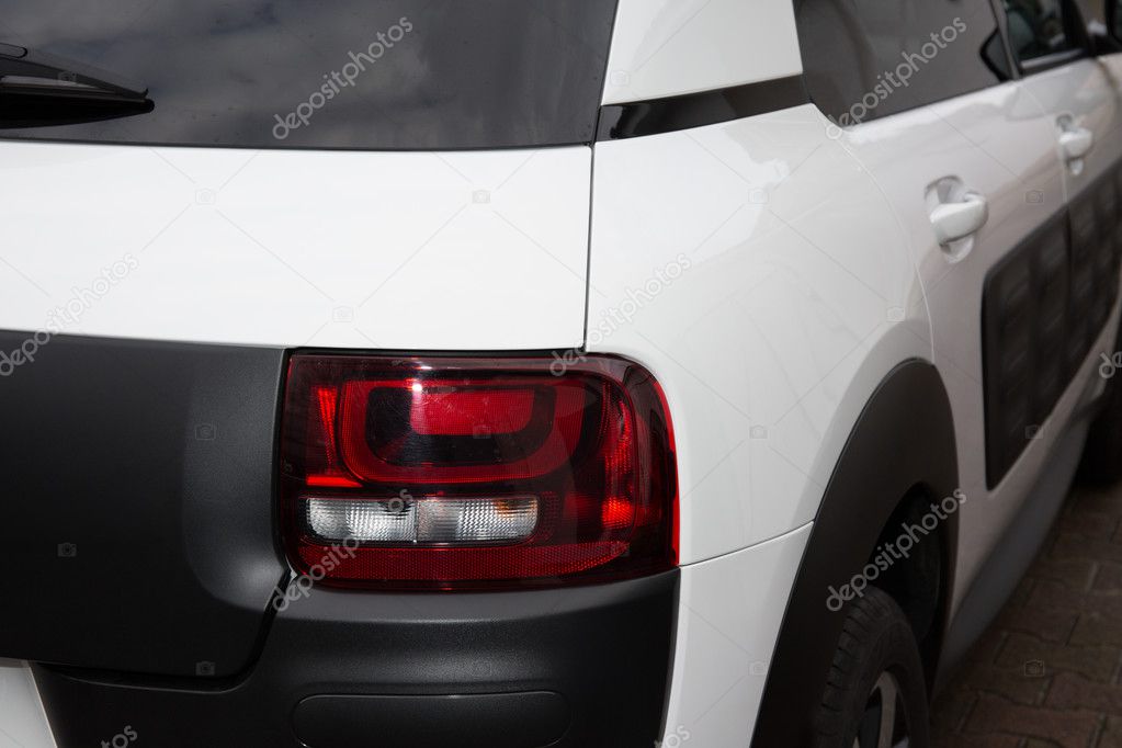 Closeup of a taillight on a modern car white and black 