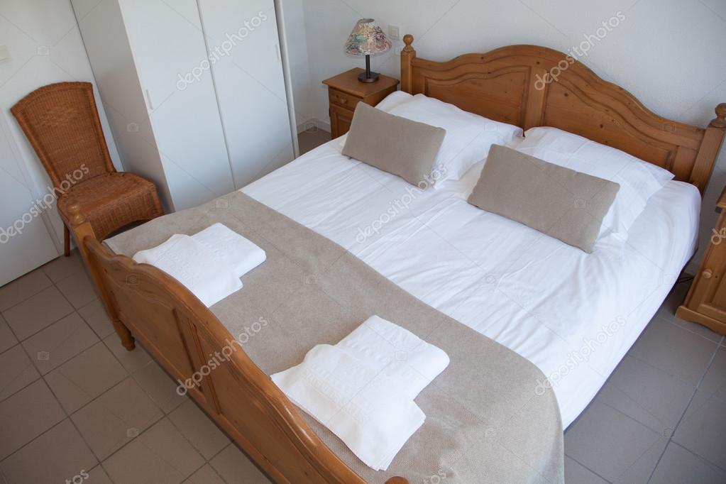 Cheerful Bedroom Interior In Brown And White Color With
