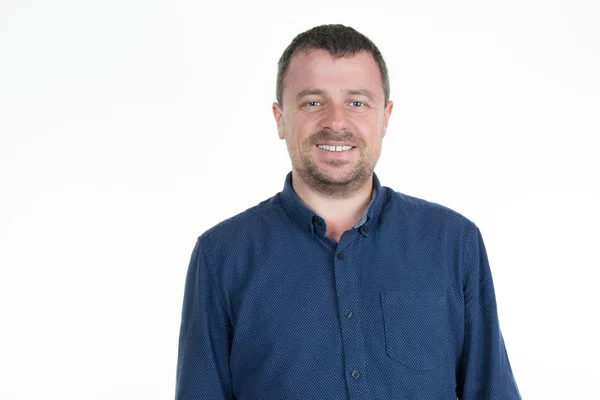 Casual man looking at camera with satisfaction — Stock Photo, Image