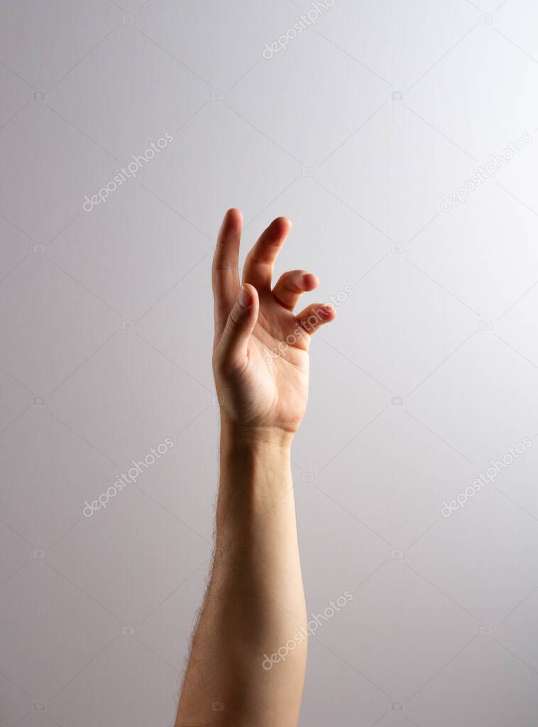hand trying to touch something on white background