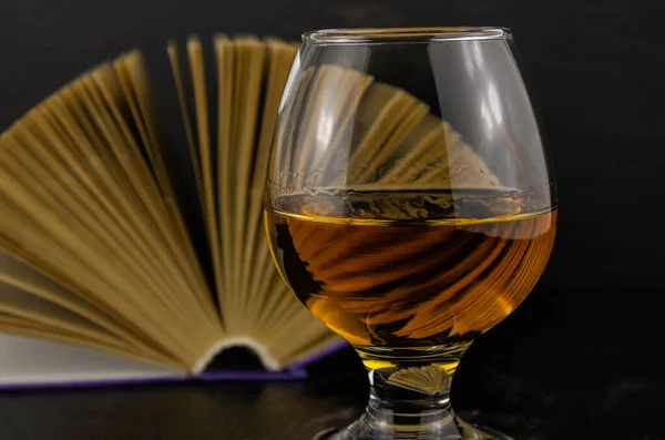 Glass Cognac Background Old Book Close — Stock Photo, Image