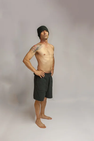 Muscle tone after 40 with beanie. — Stock Photo, Image