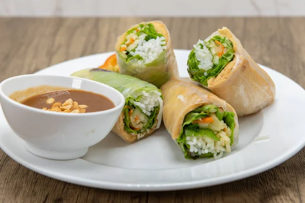 Hearty Plate Tofu Spring Rolls Cut Halves Complete Meal — Stock Photo, Image