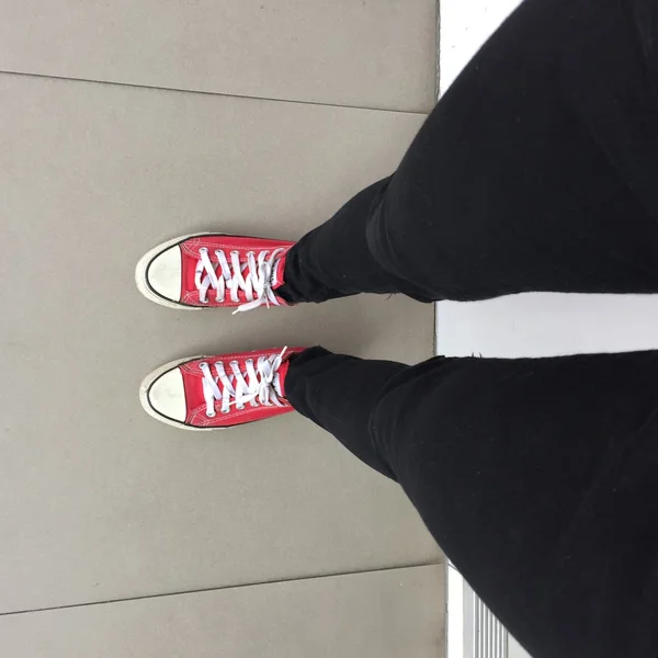 Feet From Above Concept, Teenage Person in Red Sneakers — Stock Photo, Image