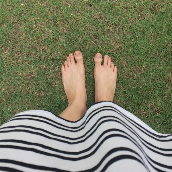 Selfie of woman bare feet on floor — Stock Photo, Image