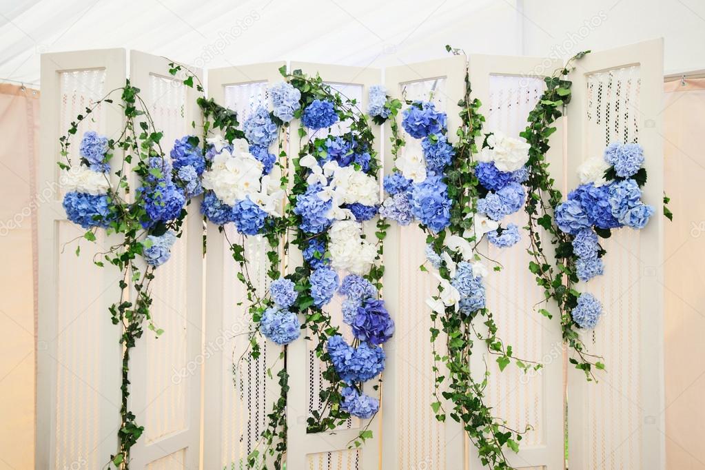 White photo-booth with blue hydrangeas