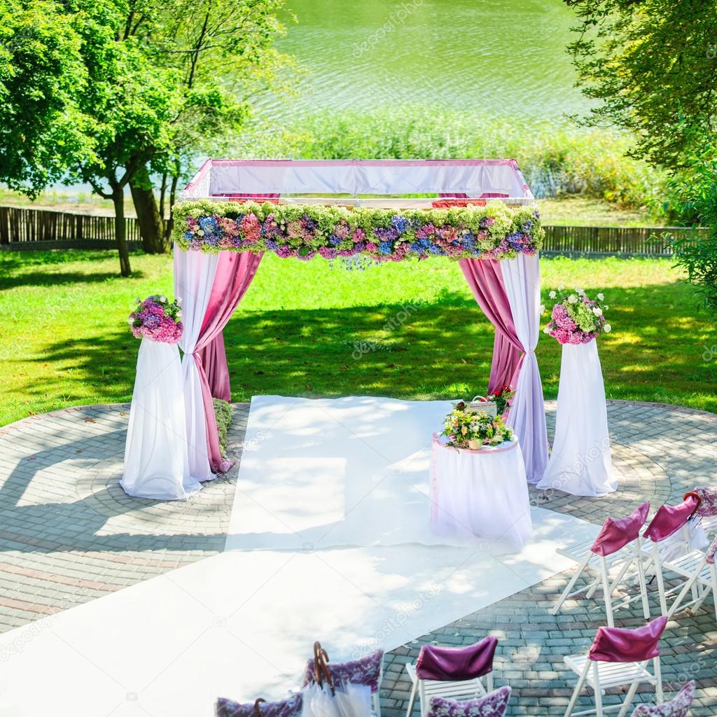 wedding arch near the lake