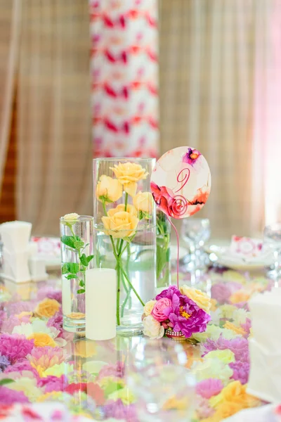 Beautiful flower composition on the table — Stock Photo, Image