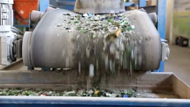 Glass waste in recycling facility. Glass particles — Stock Video