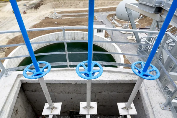 Wastewater treatment facility valves pipes — Stock Photo, Image