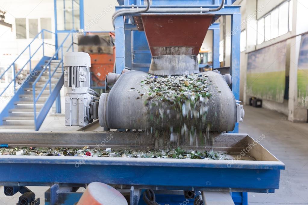 Glass waste in recycling facility. Glass particles Stock Photo by