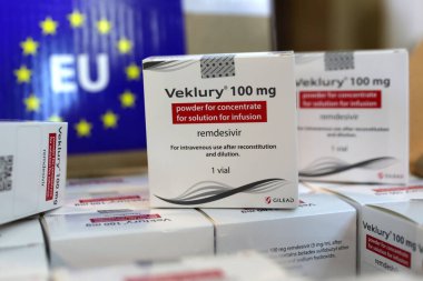 Sofia, Bulgaria - 29 October, 2020: Veklury remdesivir medication packs for the treatment of COVID-19 are seen in boxes before sent to hospitals in Bulgaria. clipart