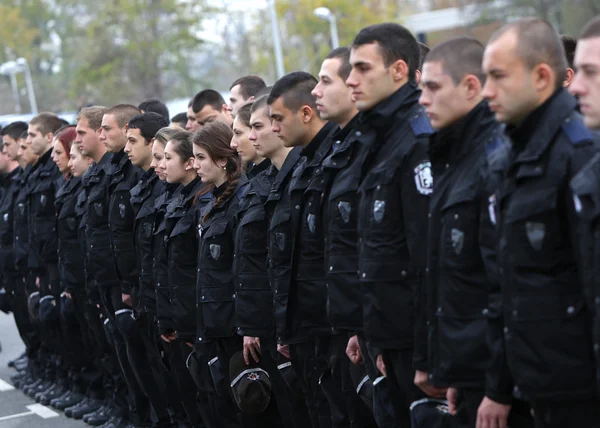 Young policemen in formation — Stock Photo, Image