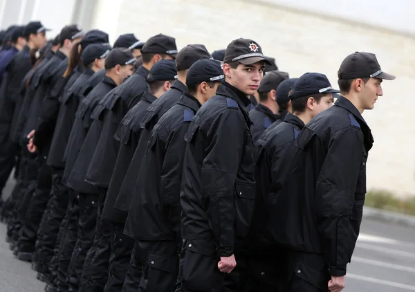 Young policemen in formation — Stock Photo, Image