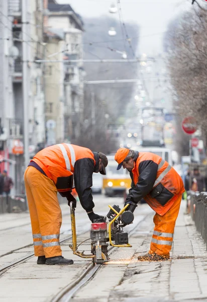 Tranvía trabajadores de la carretera reparación — Foto de Stock