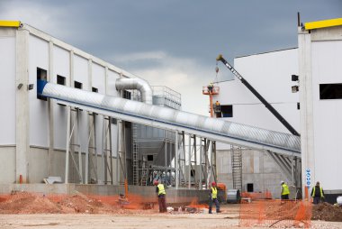 Waste plant outside process workers clipart