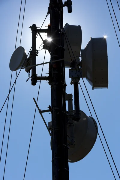 Silhouette of a communication tower in the mountain — Stock Photo, Image