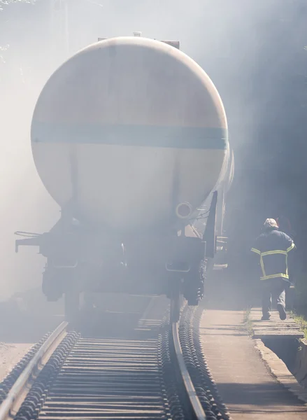 Tanker train in smoke firefighter — ストック写真