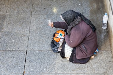 Anonymous female beggar clipart