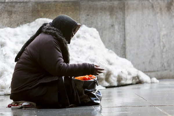 Anonymous female beggar — Stock Photo, Image
