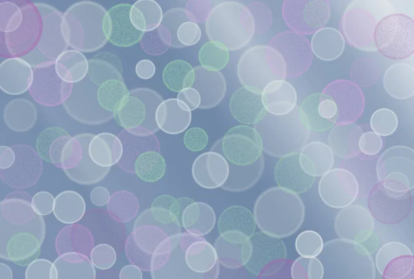 Gri ve beyaz bir gradyan üzerinde daireler şeklinde soyut bokeh