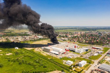 Kaliningrad, Russia - June 19 2021: Burning Miratorg meat processing plant clipart